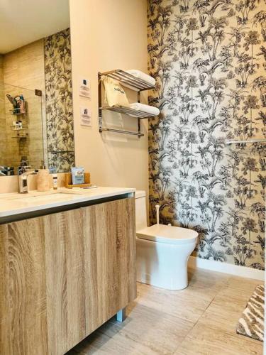 a bathroom with a sink and a toilet at BRAND NEW TOP FLOOR IN THE HEART OF MIAMI in Miami