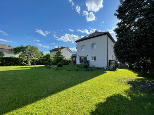 Schöne Gartenwohnung mit Carport und Terrasse!