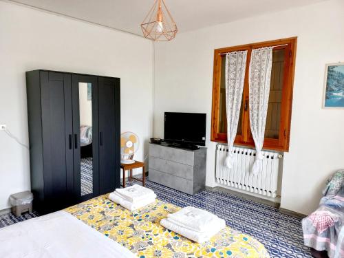 Llit o llits en una habitació de Appartamento Degli Dei (Affittacamere)