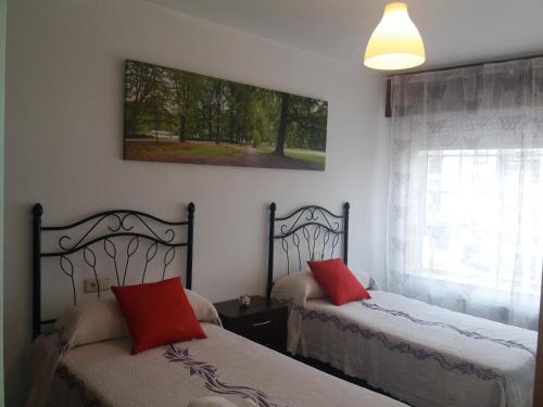Ένα ή περισσότερα κρεβάτια σε δωμάτιο στο Apartamento TEO