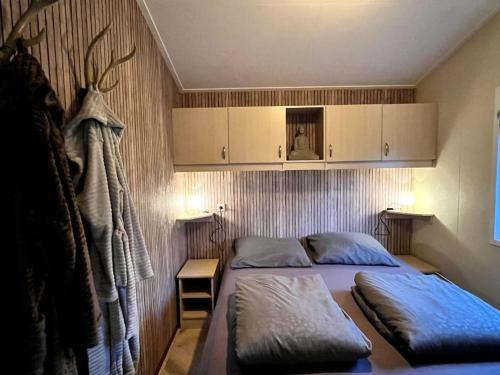 Postel nebo postele na pokoji v ubytování Het Verwende Nest met privé Hottub & tuin
