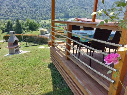 a view from the deck of a house with a hot tub at Apartments Denis in Tolmin