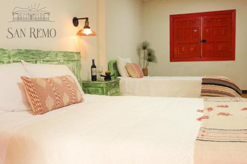 Postel nebo postele na pokoji v ubytování Hotel Rural SAN REMO
