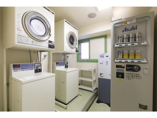 a laboratory with a machine in a room at R&B HOTEL NAGOYA SAKAE HIGASHI - Vacation STAY 40505v in Nagoya