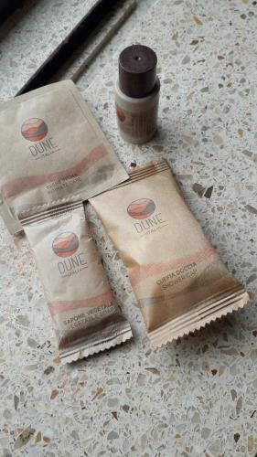 a couple of bags of coffee sitting on a table at Appartamenti Don Guglie' in Cetraro