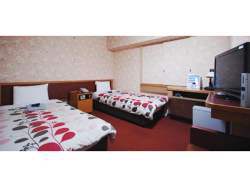 Ліжко або ліжка в номері Rico Hotel Kokura - Vacation STAY 22596v