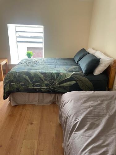 Postel nebo postele na pokoji v ubytování Danny's Bar Restaurant & accommodation