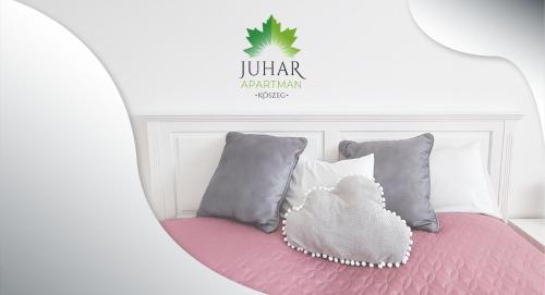 Juhar Apartmanにあるベッド