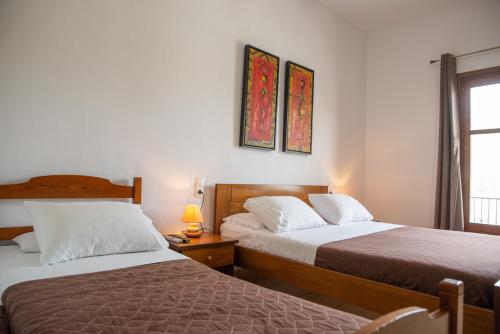 Letto o letti in una camera di Hotel Cleopatra