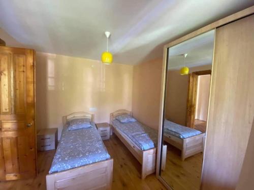 Postel nebo postele na pokoji v ubytování guesthouse MUKHA