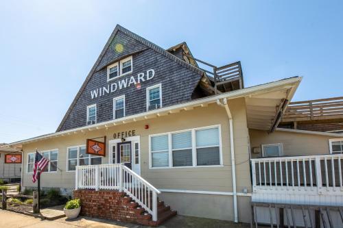 a building with a sign that reads windward at Windward at the Beach in Beach Haven