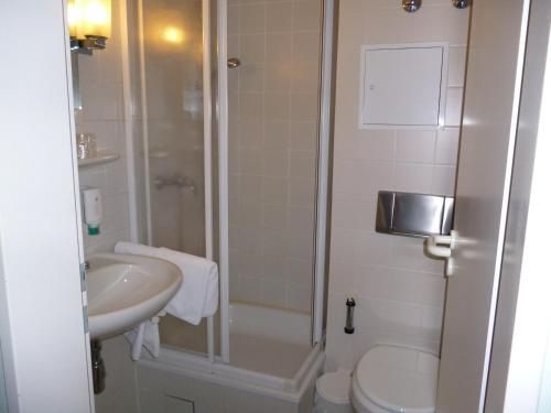Ванная комната в Hotel Brandenburg