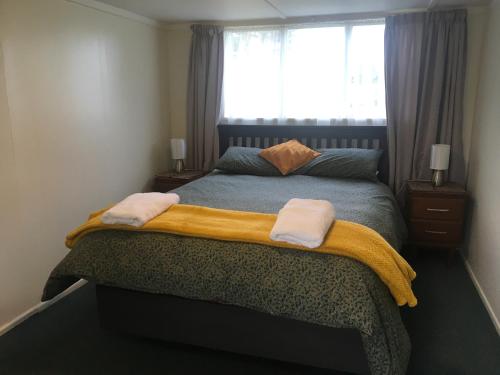 En eller flere senge i et værelse på Kepplestone by the Sea - The Catlins