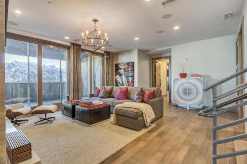 a living room with a couch and a chair at Gorgeous Five Bedroom Penthouse in the Heart of Park City apartment hotel in Park City