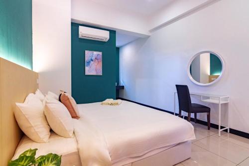 Ένα ή περισσότερα κρεβάτια σε δωμάτιο στο Scott Signature Suites by ALV