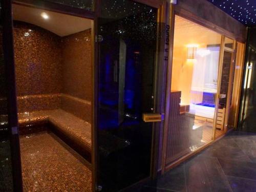 a glass door to a room with a window at Via Mar Residence - Alanya Experience in Alanya