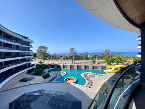 a view of a swimming pool from a building at Via Mar Residence - Alanya Experience in Alanya