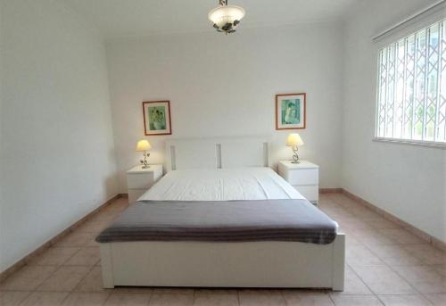 Postel nebo postele na pokoji v ubytování Vila Rosada