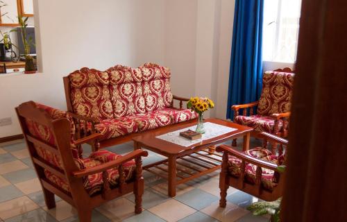Istumisnurk majutusasutuses The Impala Mauritius Bed & Breakfast