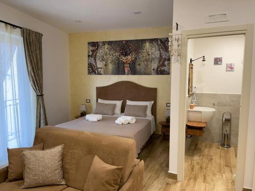Posteľ alebo postele v izbe v ubytovaní B&B Sant'Agata Patrona