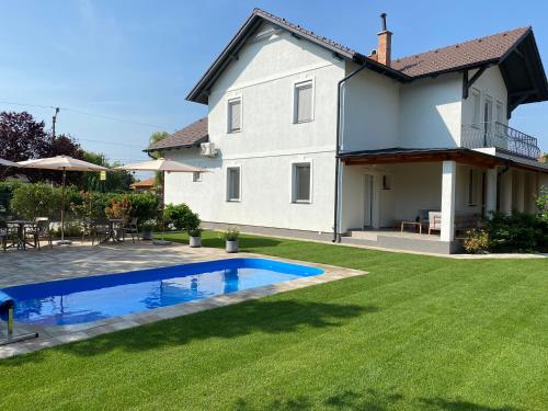 The swimming pool at or close to Best Apartman Lelle
