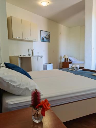 Postel nebo postele na pokoji v ubytování Residence Bella