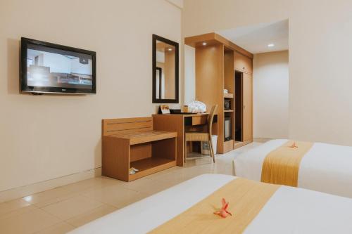 Vuode tai vuoteita majoituspaikassa Comforta Hotel Tanjung Pinang