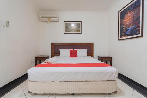 Katil atau katil-katil dalam bilik di RedDoorz Plus at Buah Batu