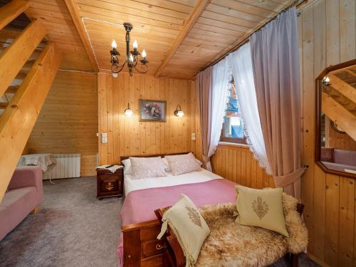ECO Willa Karpatia Ski&Wellnessにあるベッド