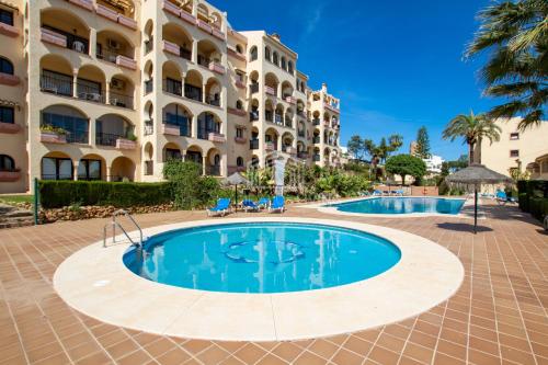 Contemporary loft style apartment with amazing sea views and with direct access to the beach from the community