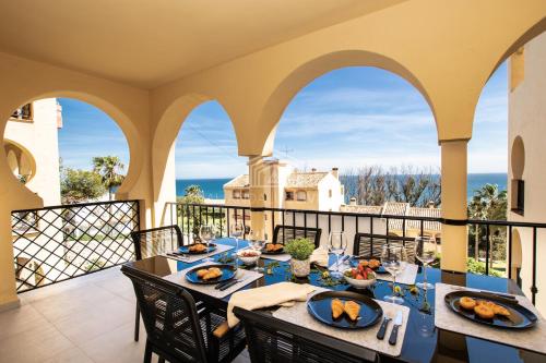 Contemporary loft style apartment with amazing sea views and with direct access to the beach from the community