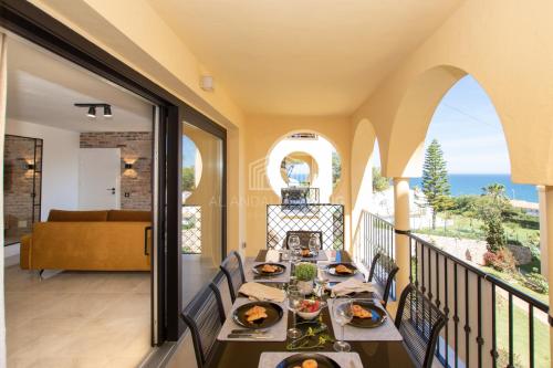 Contemporary loft style apartment with amazing sea views and with direct access to the beach from the community