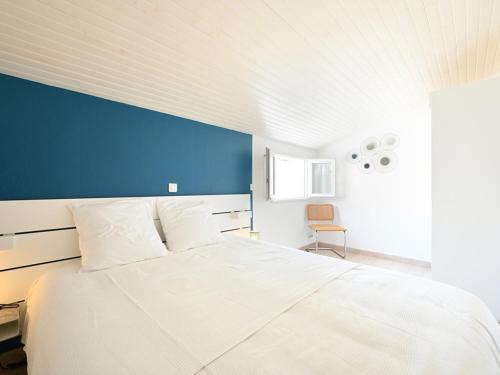 Ένα ή περισσότερα κρεβάτια σε δωμάτιο στο Maison Saint-Clément-des-Baleines, 3 pièces, 4 personnes - FR-1-434-95
