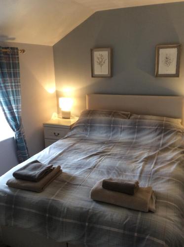 En eller flere senge i et værelse på The Lord Nelson Inn B&B