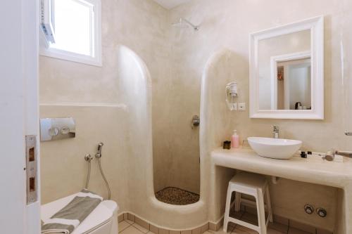Kúpeľňa v ubytovaní Naxian Emerald Hotel