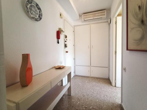 A bed or beds in a room at FIRST LINE SEASIDE - 1 Bedroom BENICASSIM TORREON