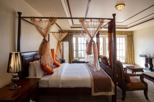 Postel nebo postele na pokoji v ubytování Meraki Holistic Wellness Retreat