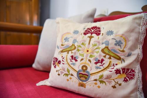 A bed or beds in a room at Smaragdi - Naxian traditional house with panoramic view at Eggares village