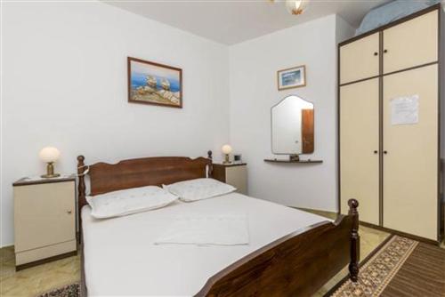 Postel nebo postele na pokoji v ubytování Apartment with sea view