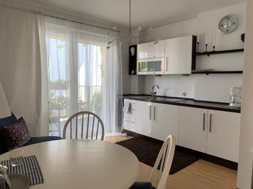Kuchyň nebo kuchyňský kout v ubytování Apartamenty Tęcza