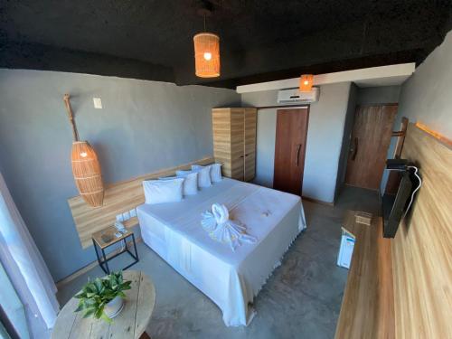 Ένα ή περισσότερα κρεβάτια σε δωμάτιο στο Vila de Taipa Exclusive Hotel