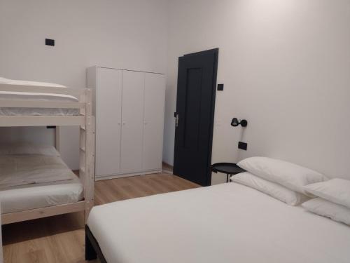 Postel nebo postele na pokoji v ubytování Appartamento Vaia