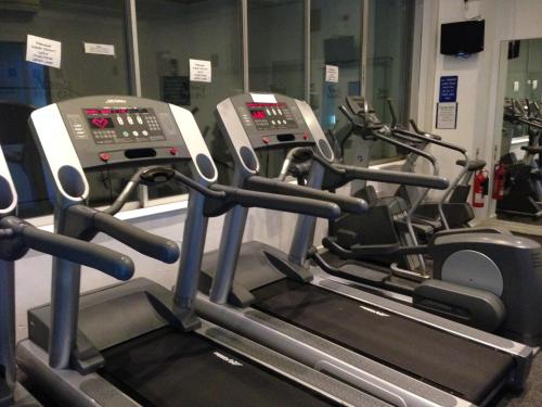 a row of cardio machines in a gym at Inn On The Prom At The Fernlea Hotel in Lytham St Annes