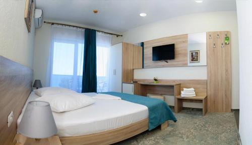 Postel nebo postele na pokoji v ubytování Hotel Union