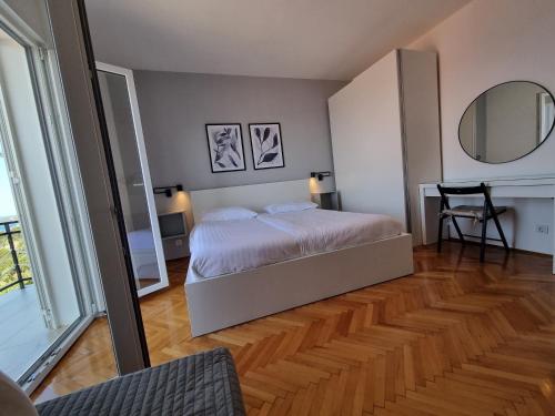 Postel nebo postele na pokoji v ubytování Apartments Lonza