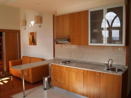 Hotel Apartamentos Geres Ribeiro tesisinde mutfak veya mini mutfak