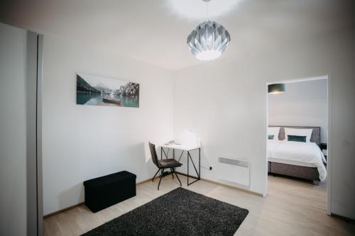 Posteľ alebo postele v izbe v ubytovaní St. Antoni Suite 7
