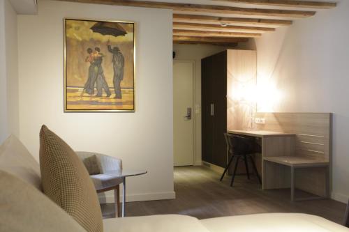 Ein Sitzbereich in der Unterkunft Chez Maman Hotel & Restaurant
