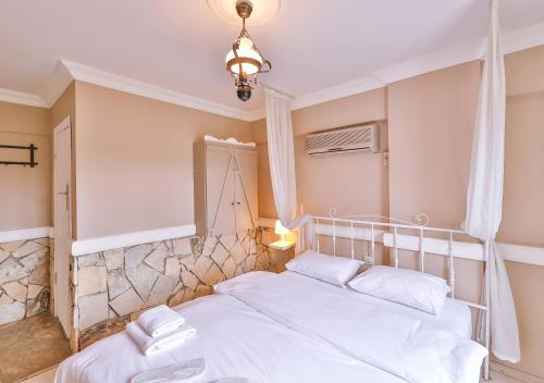 Postel nebo postele na pokoji v ubytování Ağva Acquaverde Otel