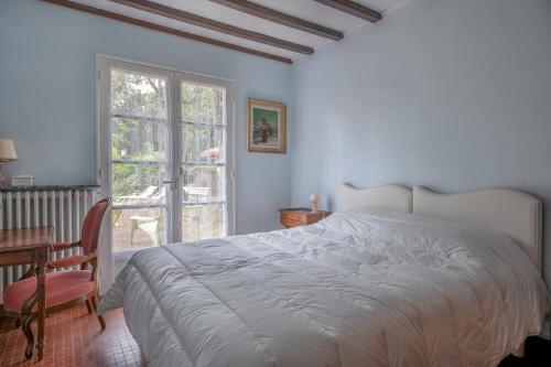 Posteľ alebo postele v izbe v ubytovaní Maison familiale dans les pins à 300 m de la Plage